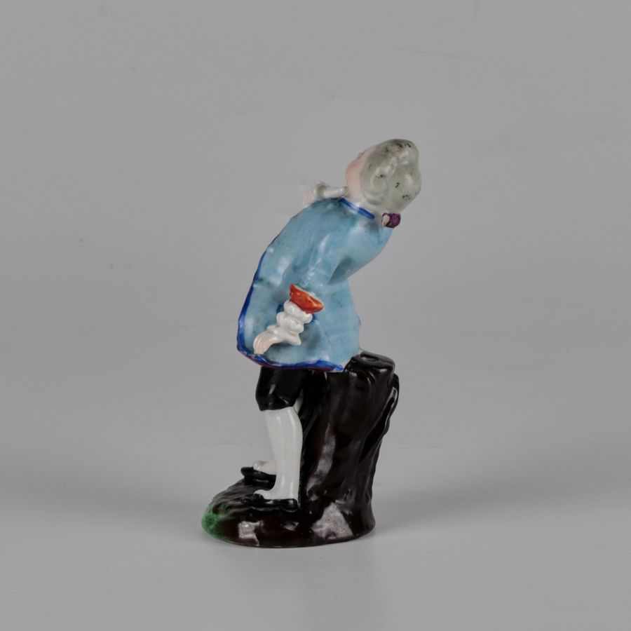 Antique Porcelain figurine of a poet.