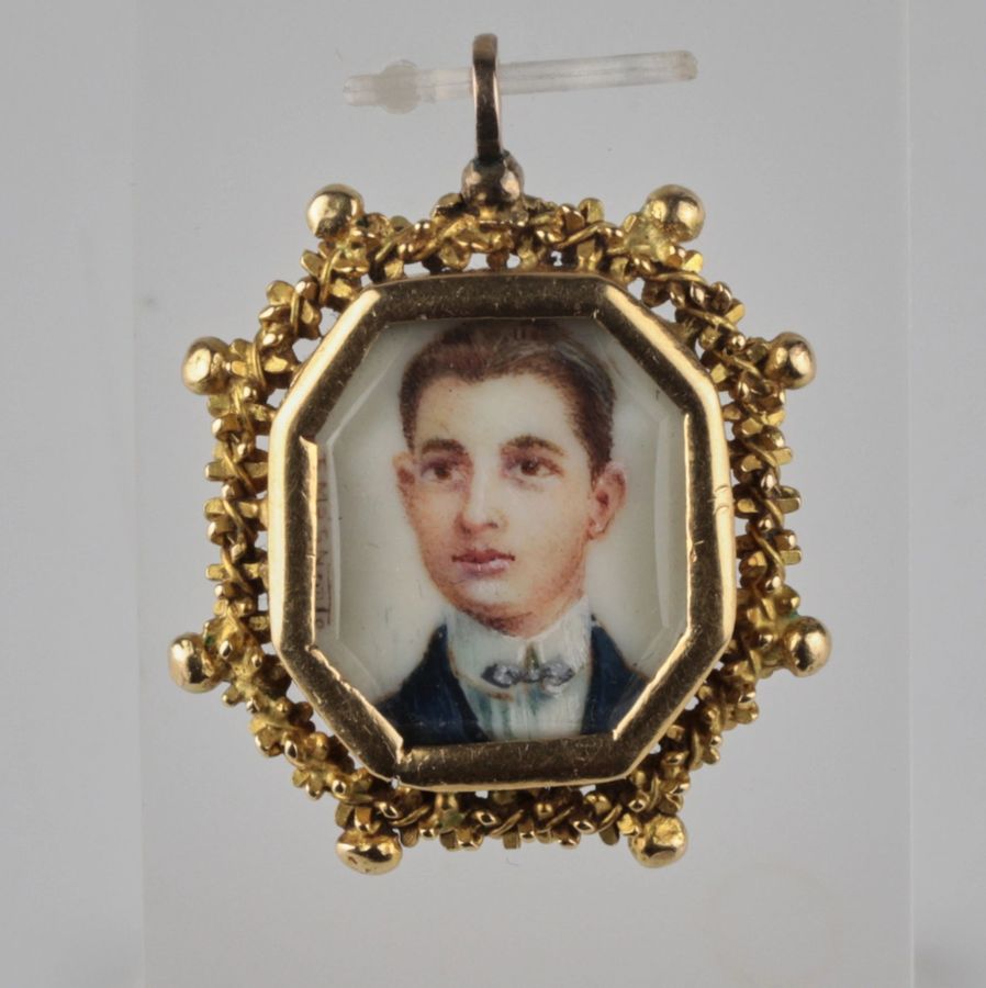 Antique Double-sided gold pendant with a portrait miniature.