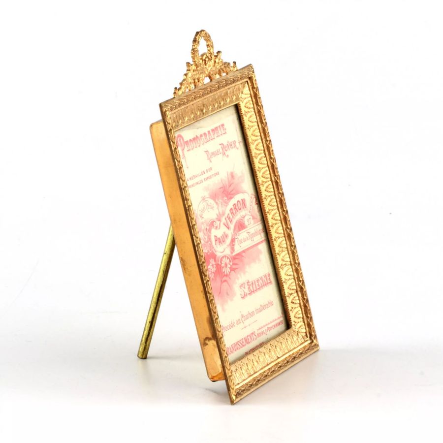 Antique Photo frame of gilded bronze, neoampire style.
