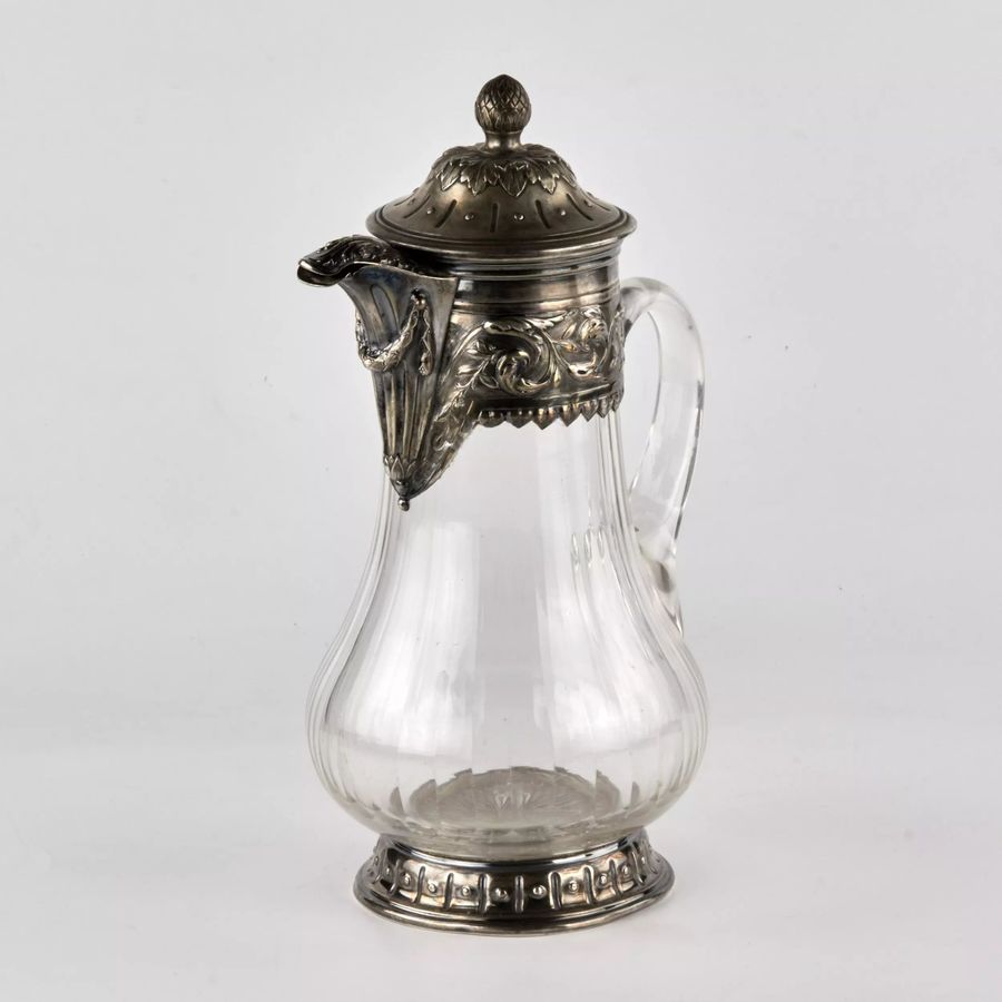 Antique Wine jug, glass in silver.