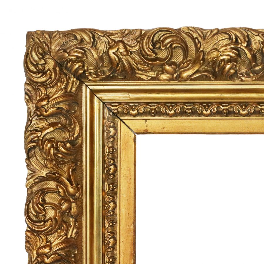 Antique Large gilded wooden frame in the Baroque style.
