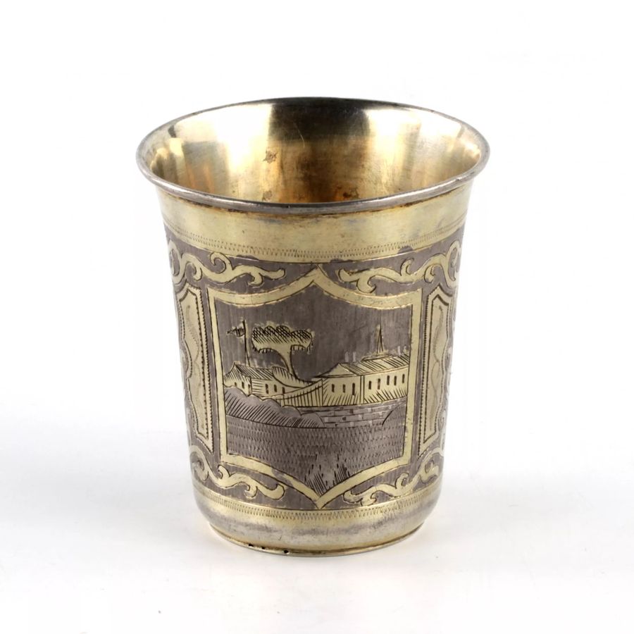Antique Russian  silver vodka cup with city views.