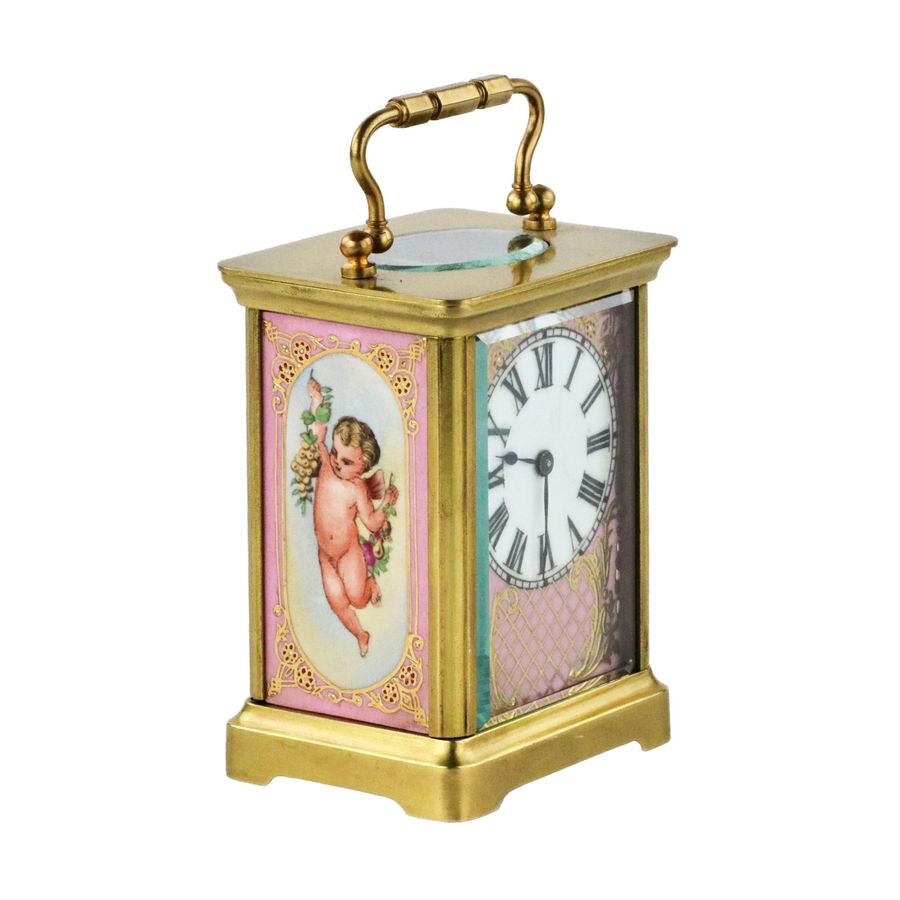 French carriage clock with porcelain painting, neo-rococo style. The turn of the 19th-20th centur...