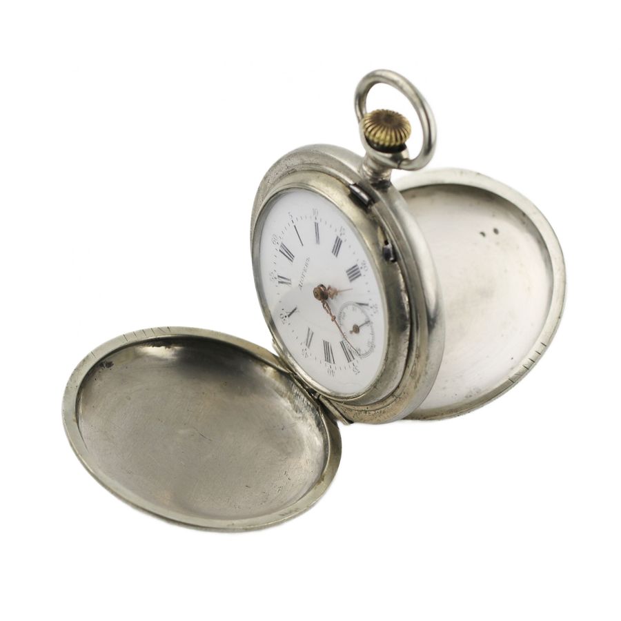 Antique Russian pocket watch with blackened metal pattern. Diogenes company. Early 20th century.