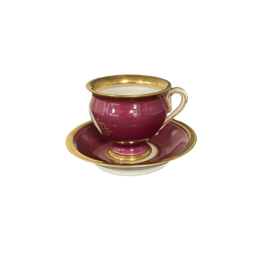 Antique Royal Copenhagen Empire-style cup and saucer.