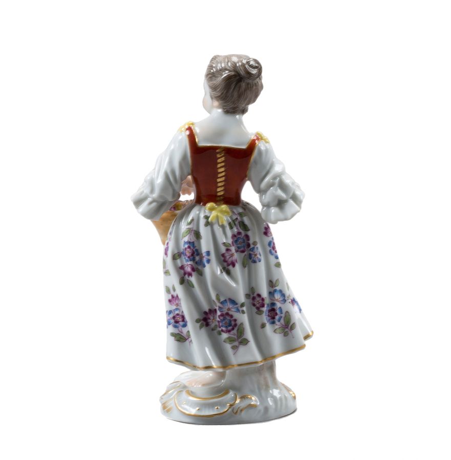 Antique Girl with a basket. Meissen