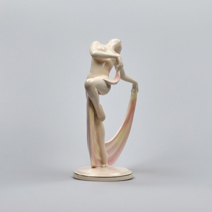 Antique Figurine of a dancer in the Art Deco style.