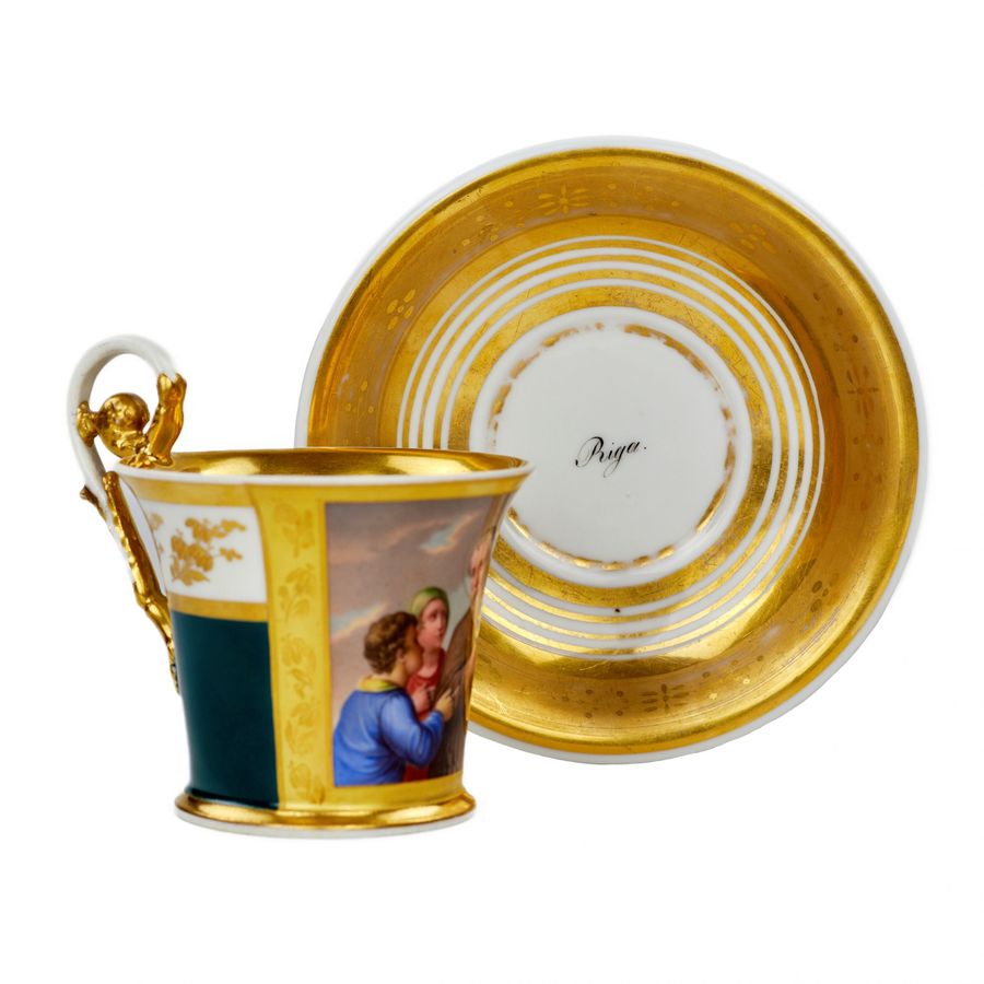 Antique Painted cup and saucer from the Biedermeier period.