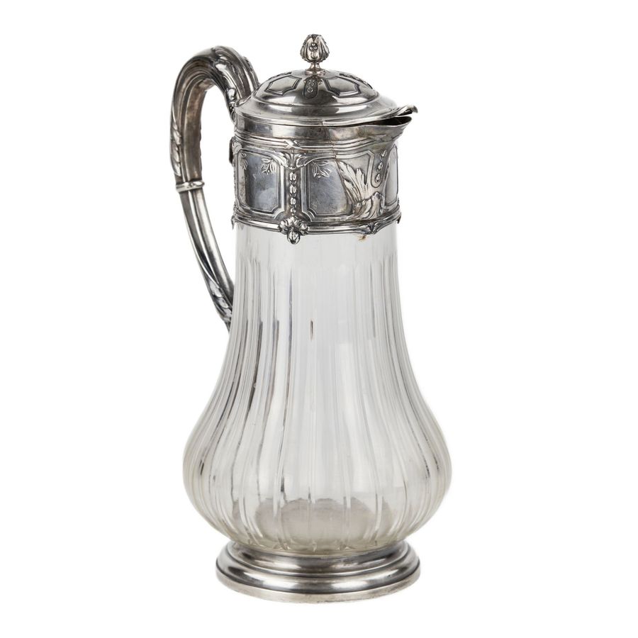 Antique French glass jug for water in silver. Late 19th century.
