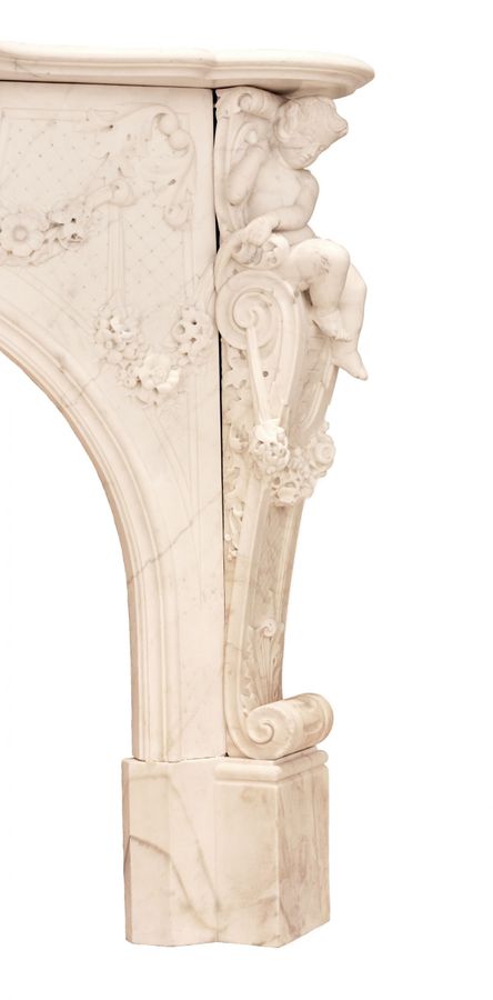 Antique French white marble fireplace with cupids, Louis XV style. 19th century