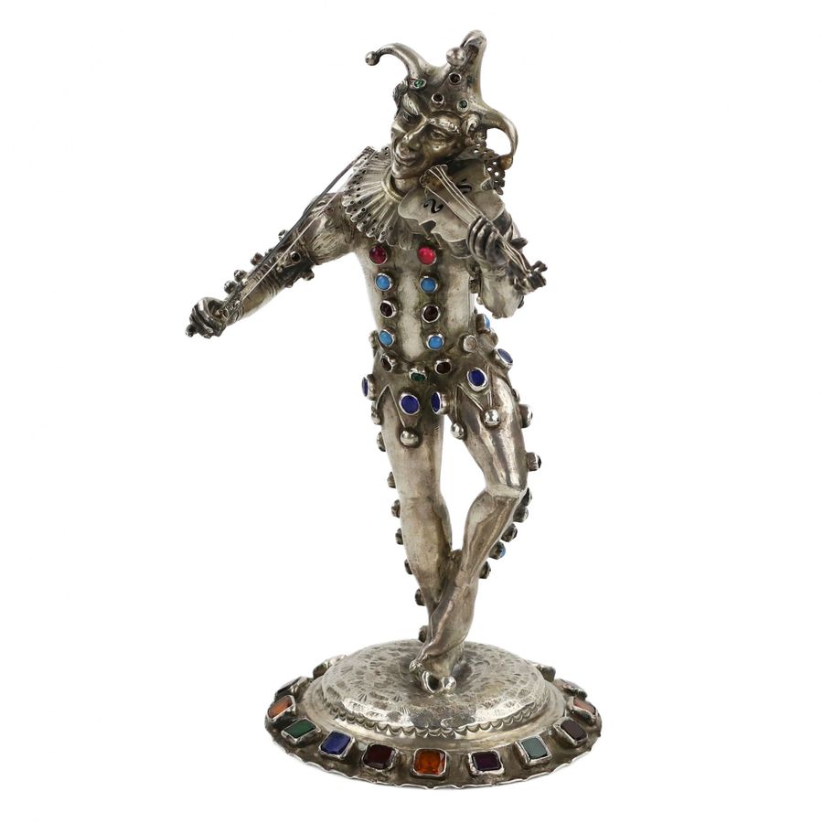 Antique Silver figure of a playing Harlequin. Germany. 19th century.
