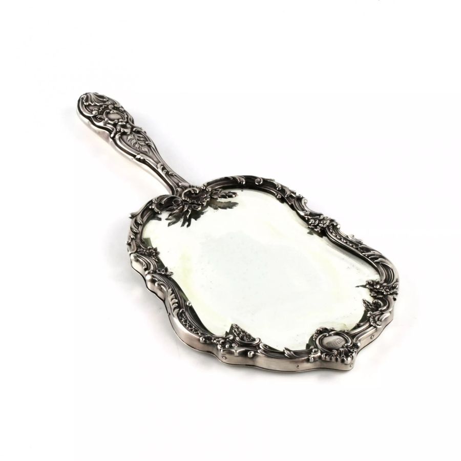 Antique Silver hand mirror Louis XV style.