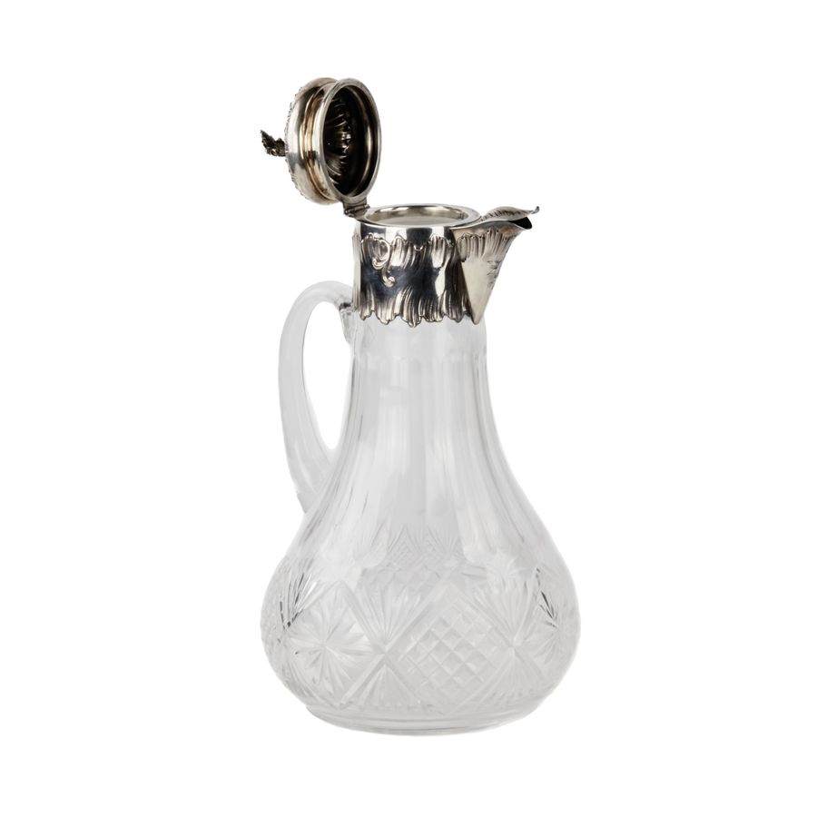 Antique French crystal jug with silver.