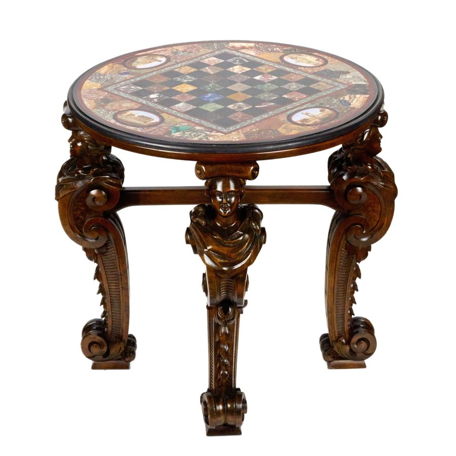 Antique An impressive chess table with precious Roman mosaics on carved legs.