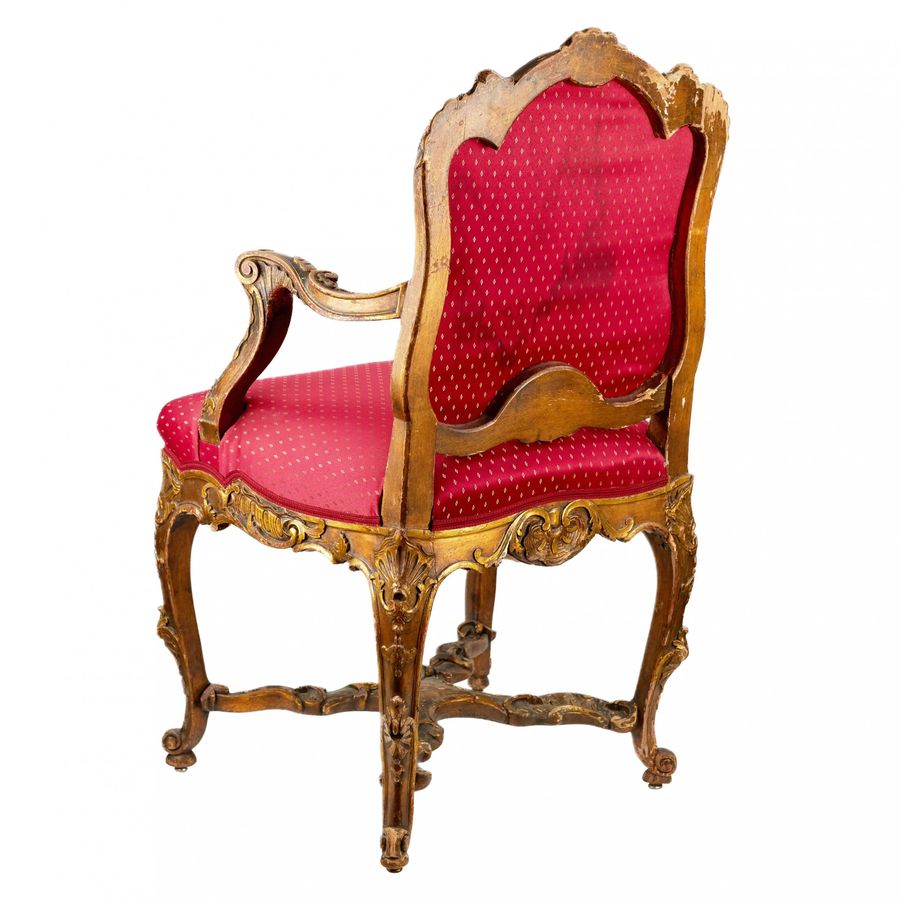 Antique Magnificent, carved chair in the Rococo style of the 19th-20th centuries.