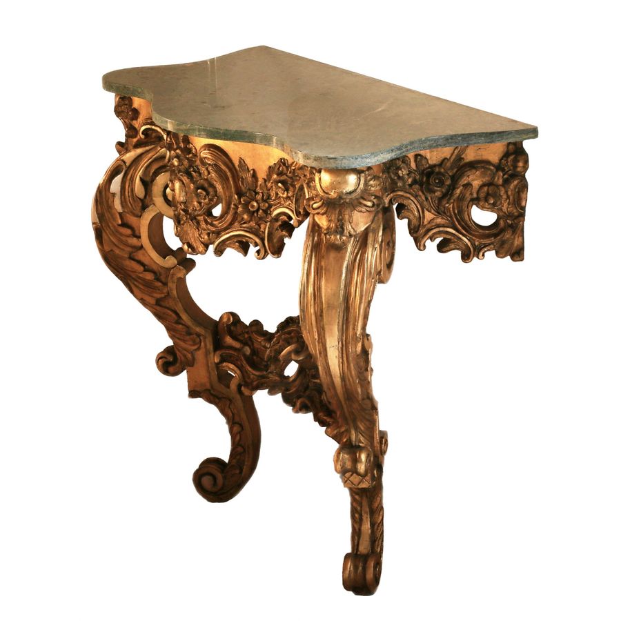 Antique Wooden, gilded console of the 19th century.