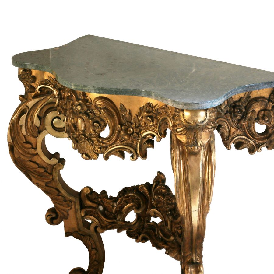 Antique Wooden, gilded console of the 19th century.