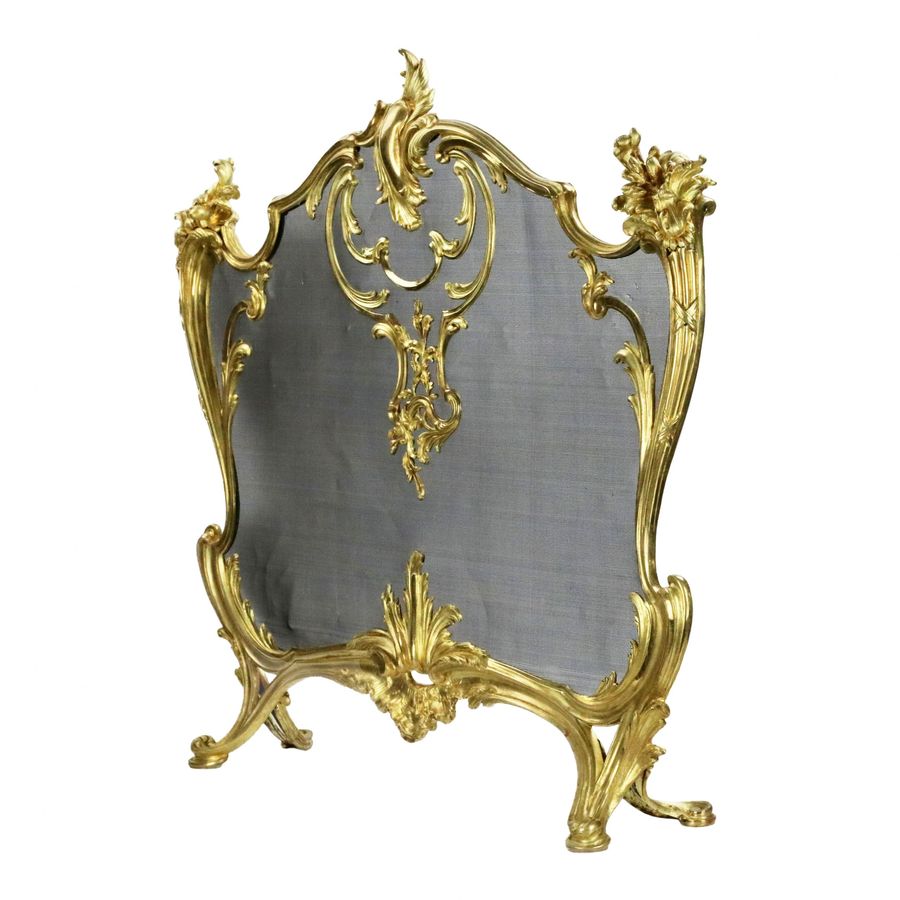 Antique Bouhon. Fireplace screen in gilded bronze with metal protective mesh, Louis XV style.