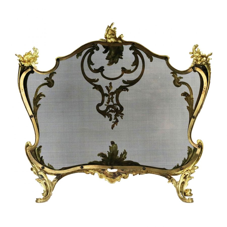 Antique Bouhon. Fireplace screen in gilded bronze with metal protective mesh, Louis XV style.