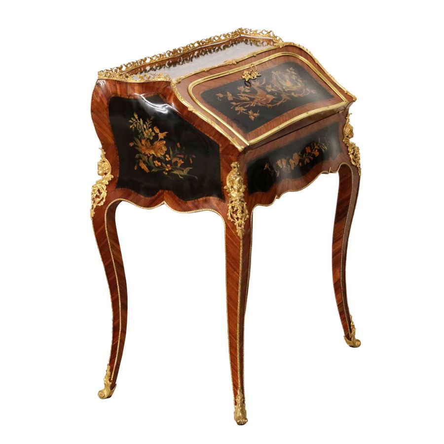 Antique Coquettish ladies` bureau in wood and gilded bronze, Louis XV style.