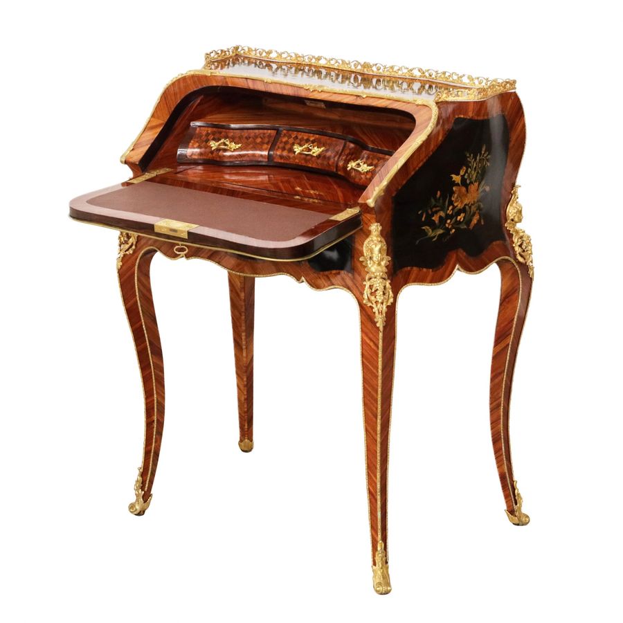 Antique Coquettish ladies` bureau in wood and gilded bronze, Louis XV style.