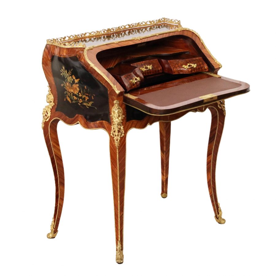 Antique Coquettish ladies` bureau in wood and gilded bronze, Louis XV style.