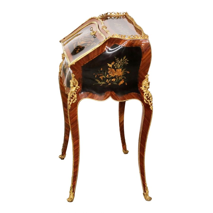 Antique Coquettish ladies` bureau in wood and gilded bronze, Louis XV style.