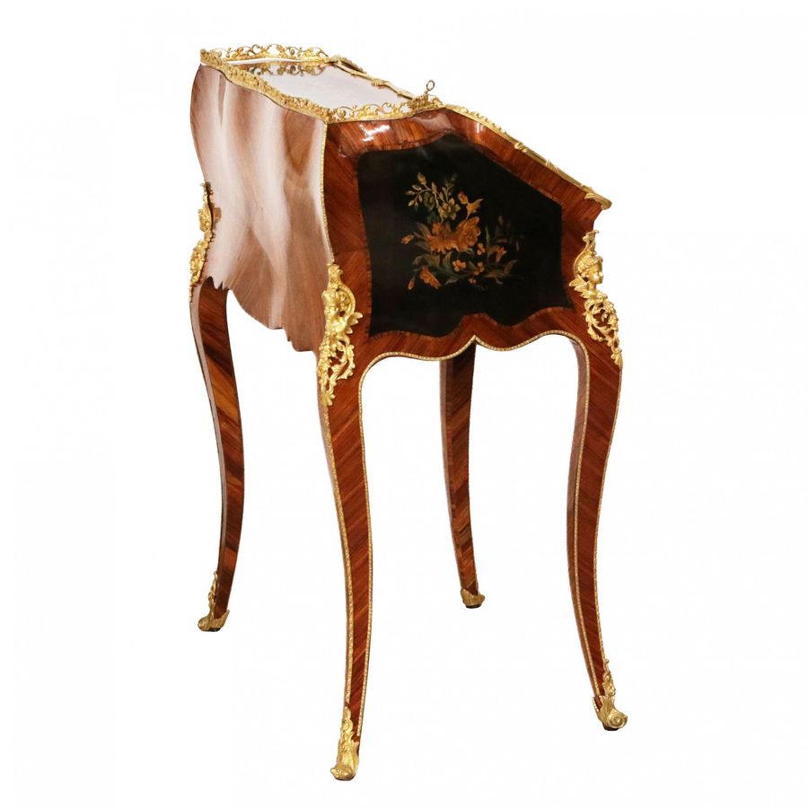 Antique Coquettish ladies` bureau in wood and gilded bronze, Louis XV style.