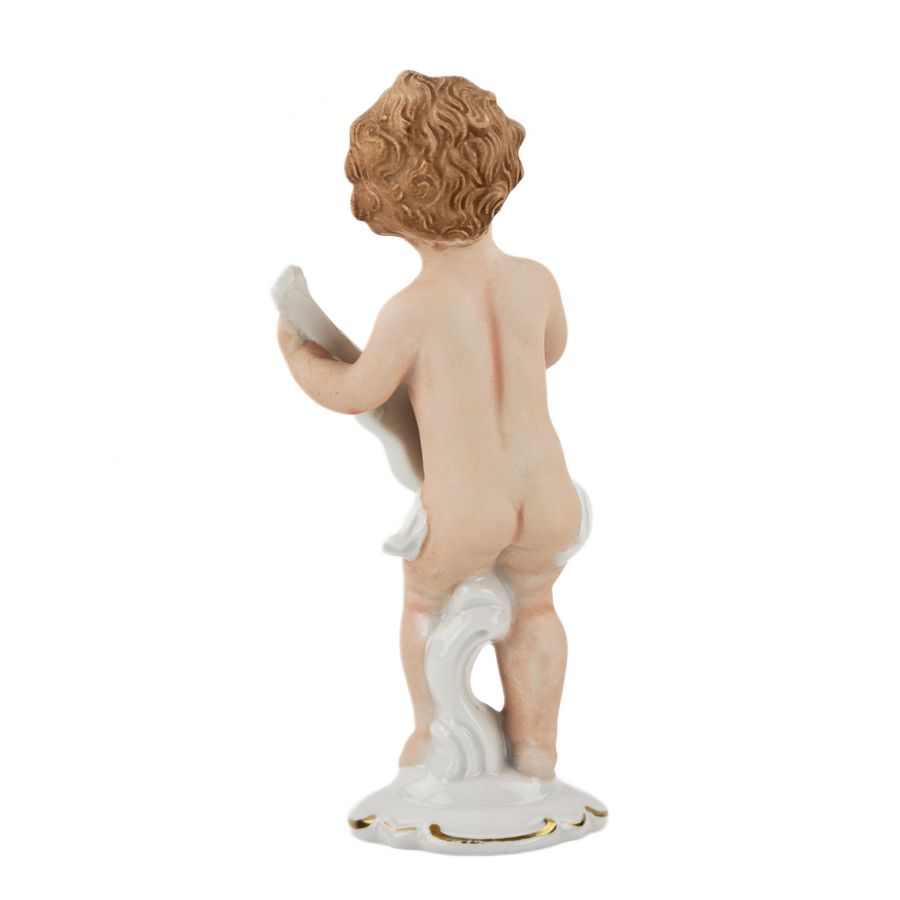 Antique Porcelain figurine of a putti playing guitar. Germany.