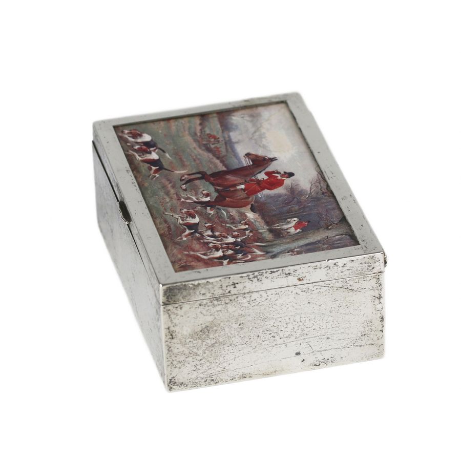 Antique Wooden box upholstered with silver-plated metal. 20th century.