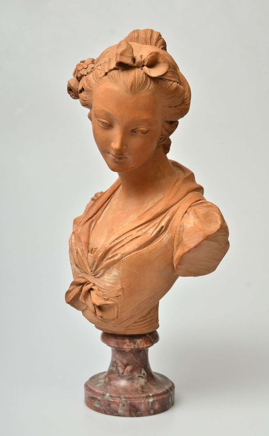 Antique Terracotta bust on a marble base Bust of a Virgin