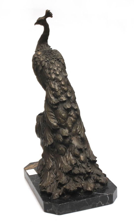 Antique Bronze peacock on a granite base