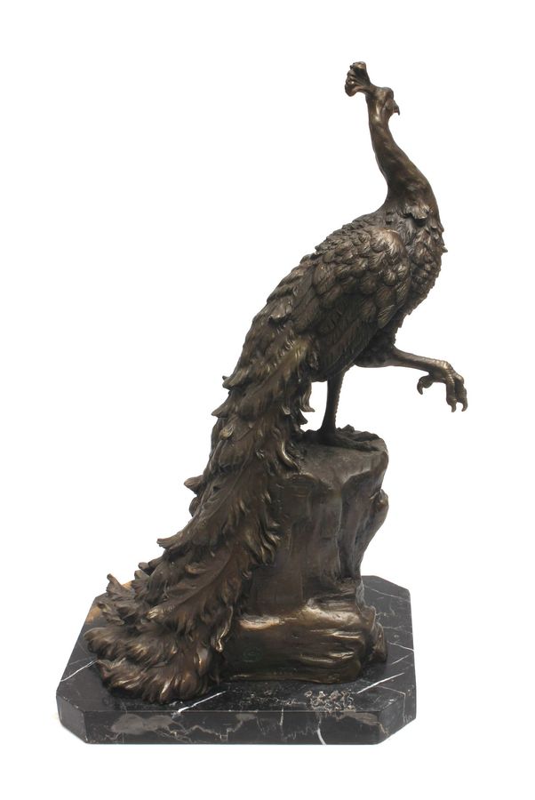 Antique Bronze peacock on a granite base