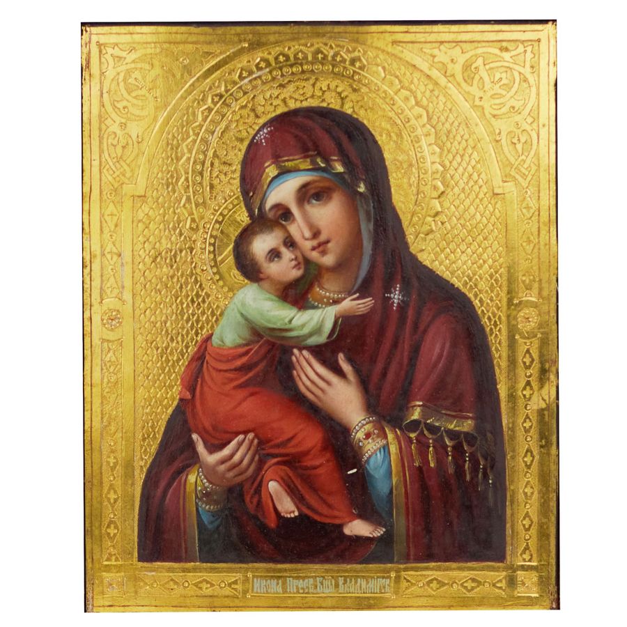 Antique Icon of Our Lady of Vladimir at the turn of the 19th-20th centuries in an icon case.