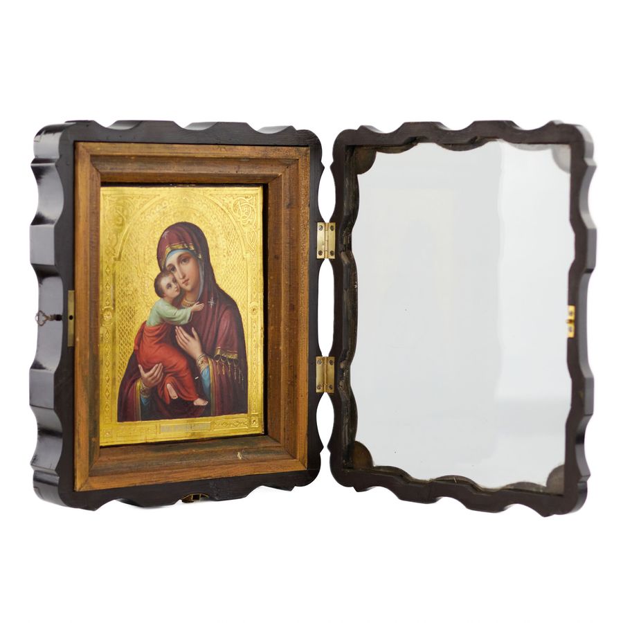 Antique Icon of Our Lady of Vladimir at the turn of the 19th-20th centuries in an icon case.