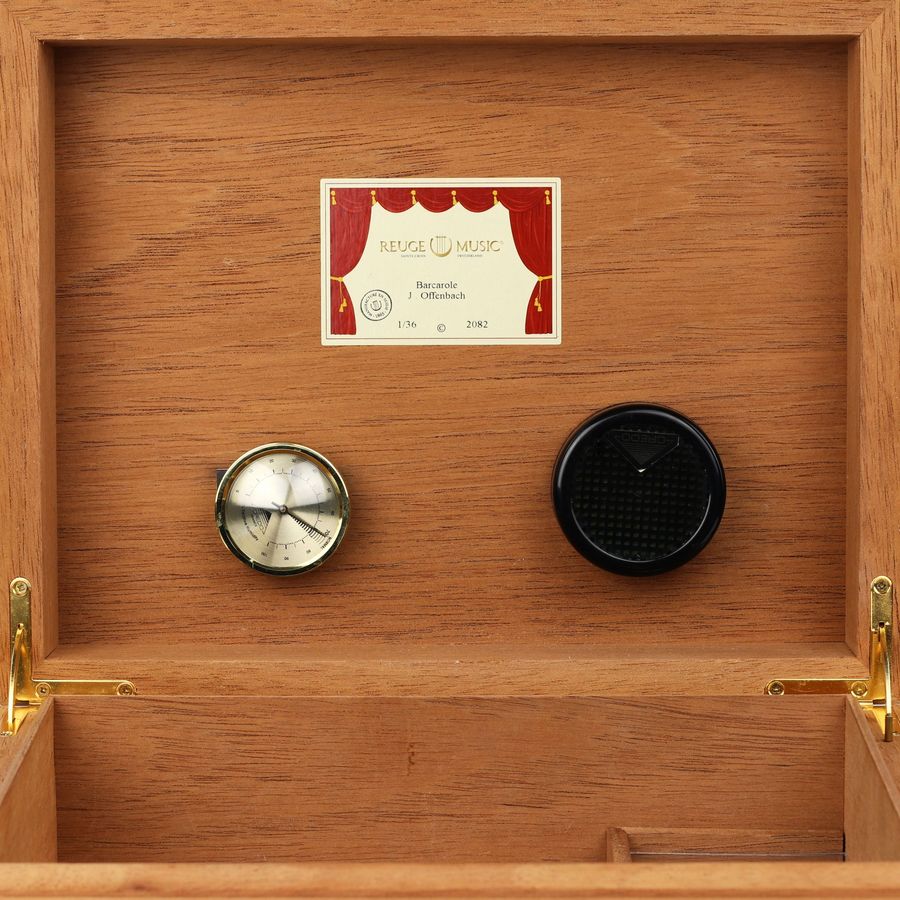 Antique Humidor with musical mechanism by Reuge Music.