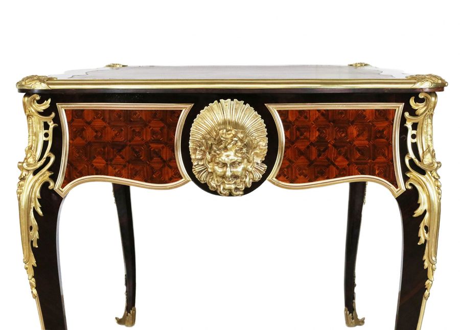 Antique Magnificent writing desk in wood and gilded bronze, Louis XV style.