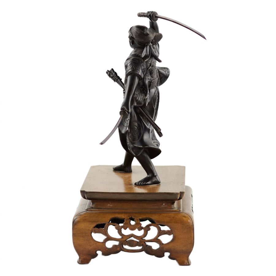 Antique Japanese bronze sculpture of a samurai warrior. Japan. Meiji. The turn of the 19th-20th century.