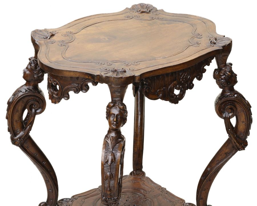 Antique Carved wooden table in neo-Rococo style from the turn of the 19th century.