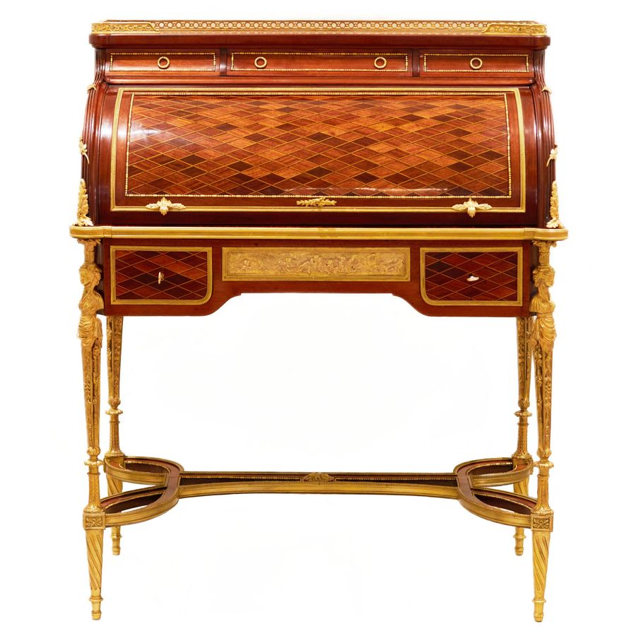 Antique E.KAHN. A magnificent cylindrical bureau in mahogany and satin wood with gilt bronze.