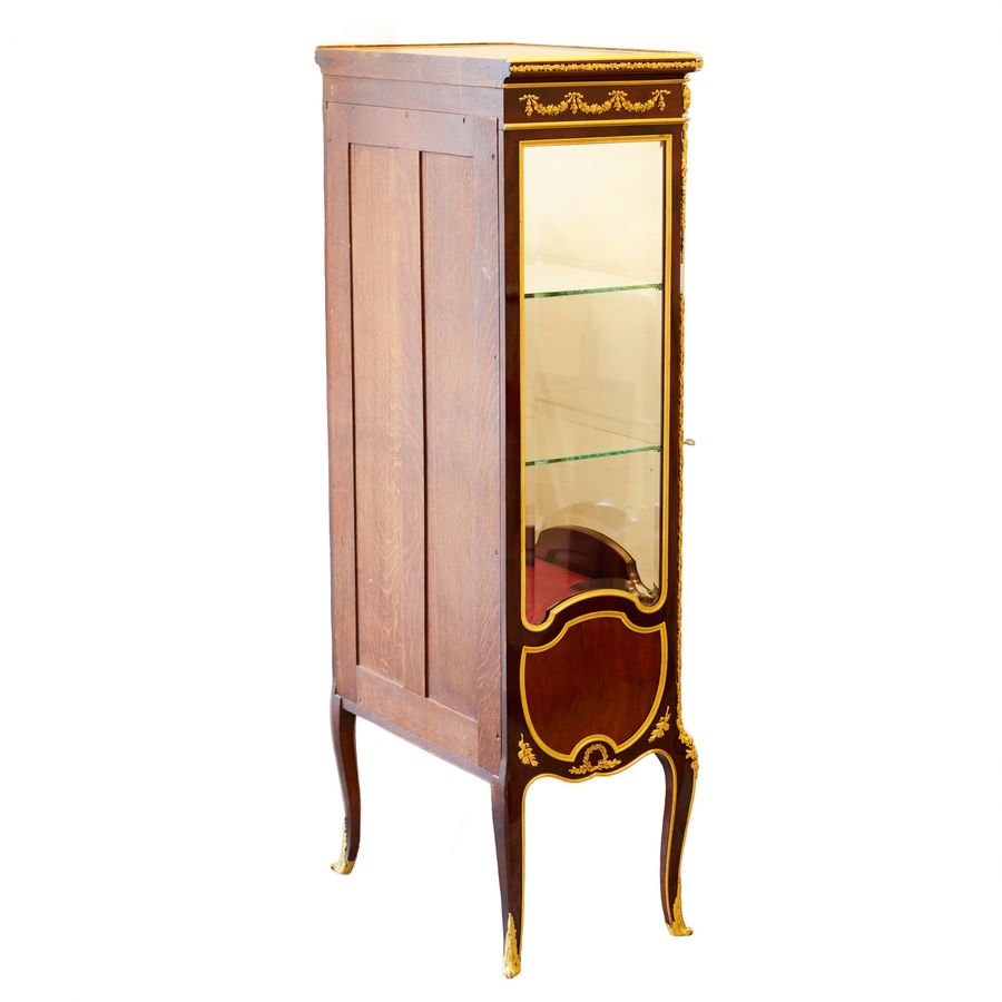 Antique Showcase in mahogany and gilded bronze in Sormani style. France 19th century.