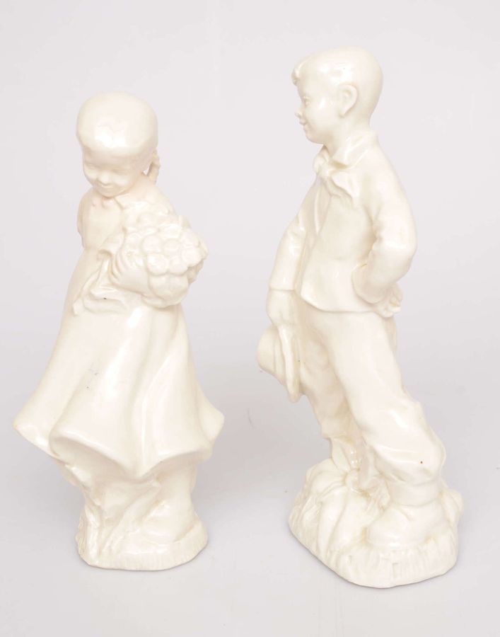 Antique Pair of porcelain figures Girl and boy