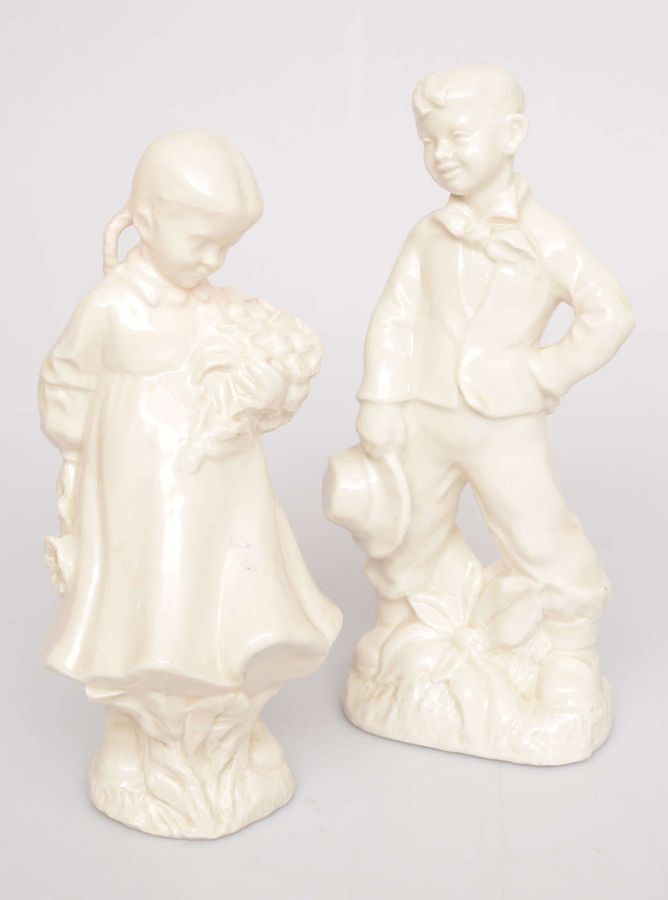 Antique Pair of porcelain figures Girl and boy