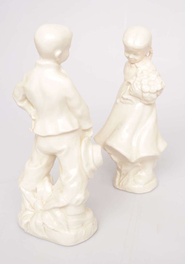 Antique Pair of porcelain figures Girl and boy