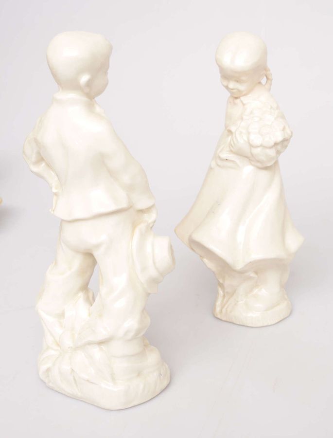 Antique Pair of porcelain figures Girl and boy