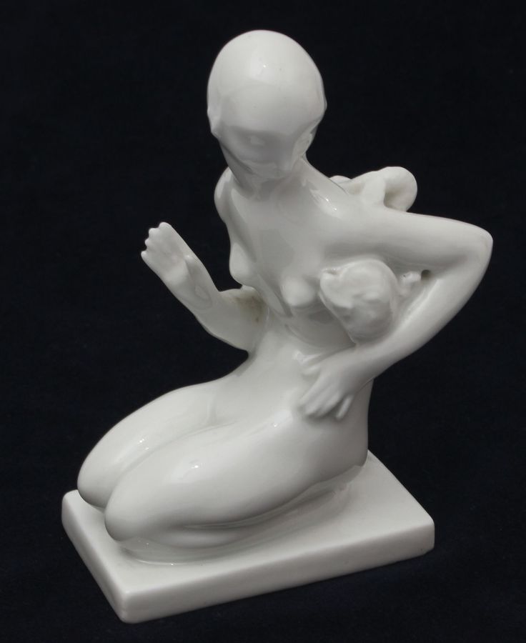 Antique Porcelain figurine Girl with a fish