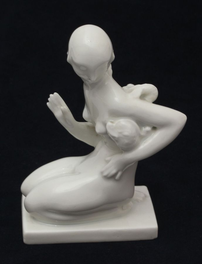 Antique Porcelain figurine Girl with a fish