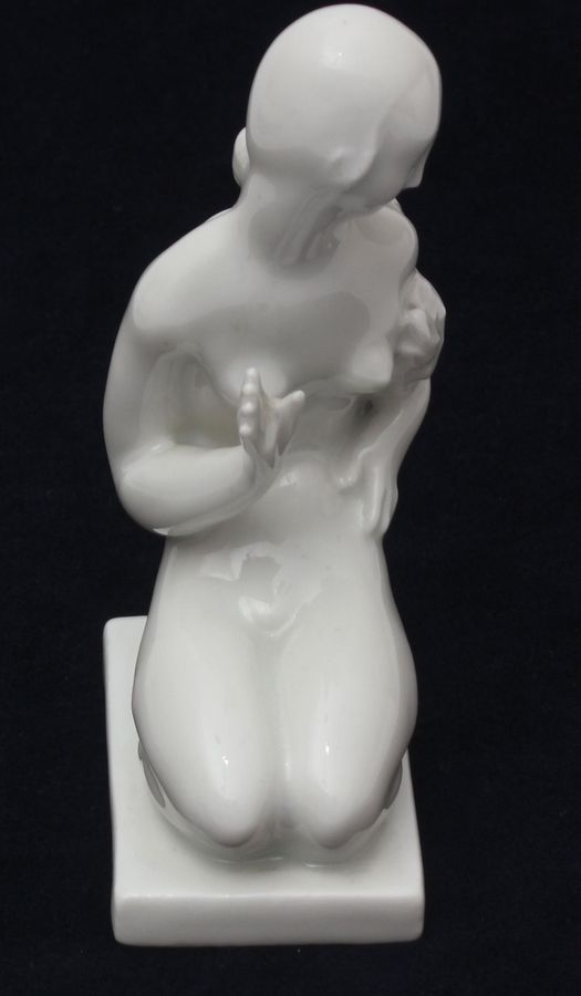 Antique Porcelain figurine Girl with a fish