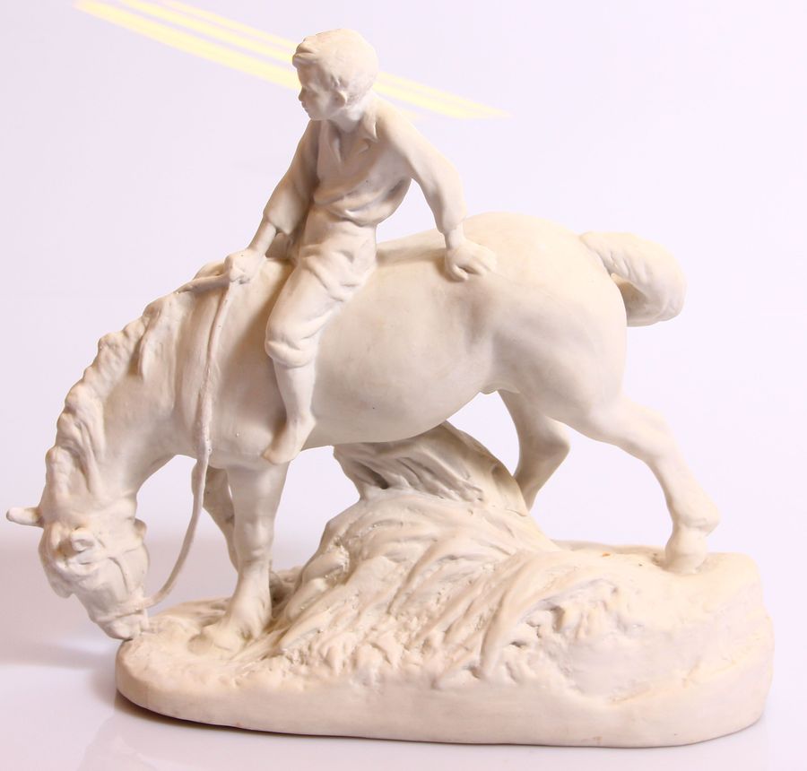 Antique Biscuit figurine Boy on a horse