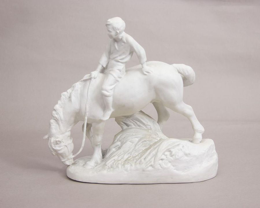 Antique Biscuit figurine Boy on horse